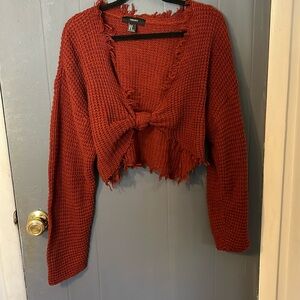 Waffle knit cropped sweater with a tie front
